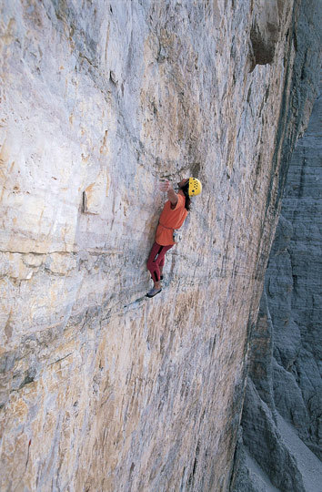 Alexander Huber free soloing the Hasse Brandler Direttissima on Cima Grande, Dolomites. [Photo] Alex ...